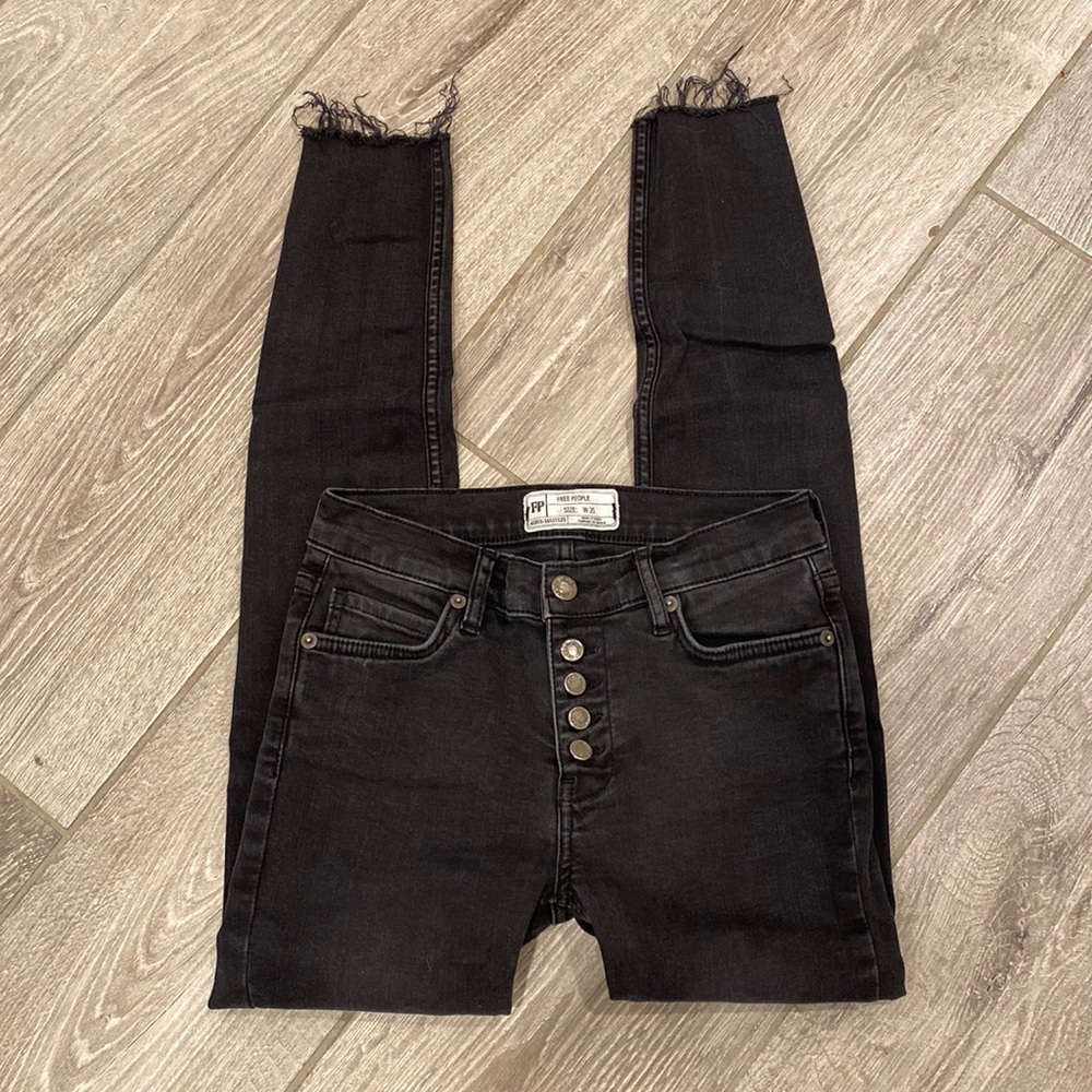 Black Free People ripped hem jeans